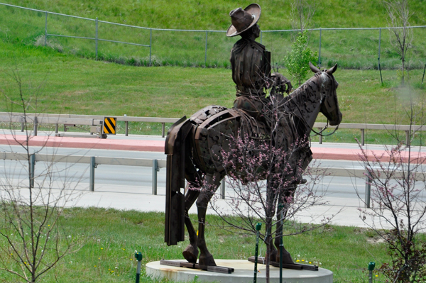 A cowboy and his horse  statue